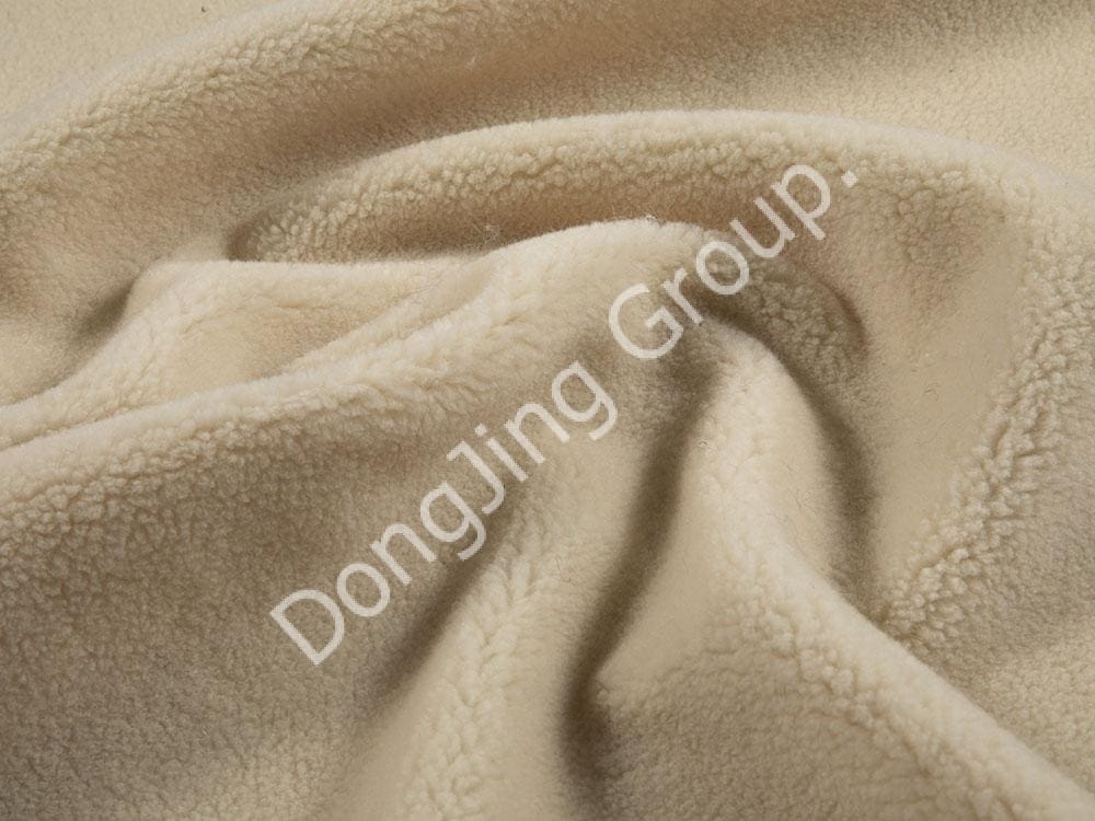 9P2124-Poil d'agneau mérinos blanc cassé faux fur fabric