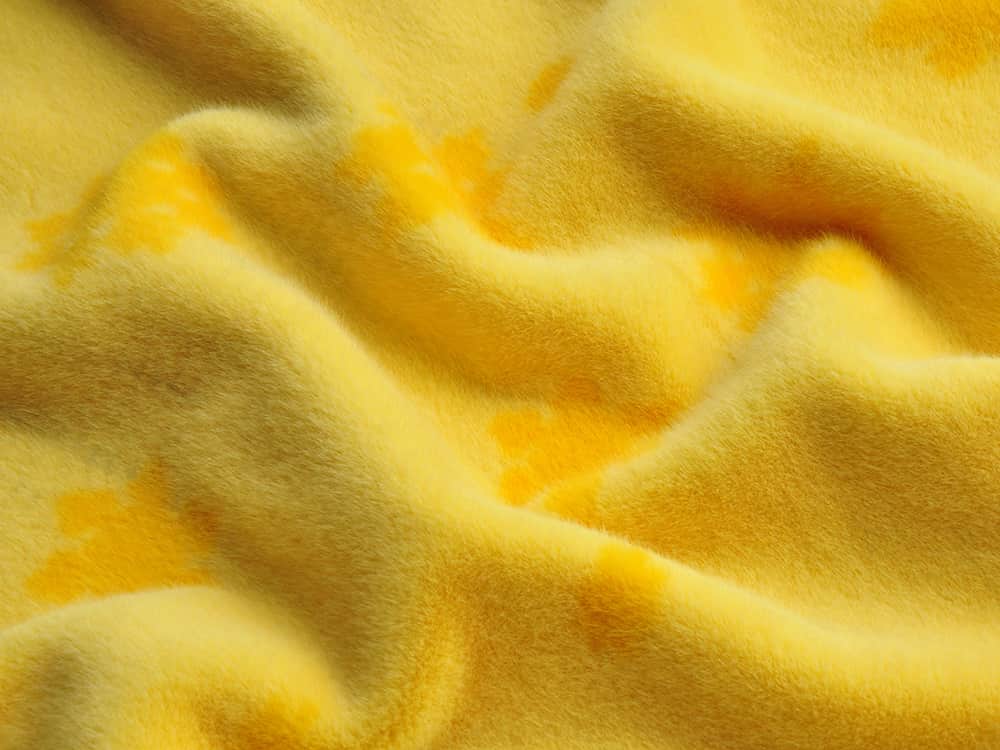 Quel type de tissu est la toison de corail? Quelle est la méthode de nettoyage ?